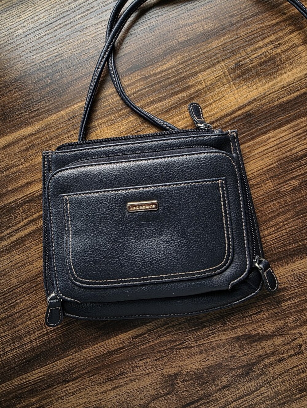 Compact Navy Crossbody with Front Pocket and Gold Accent